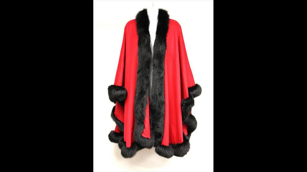 Red cashmere cape with dyed black mink trim, Edwards-Lowell label and 1.5-inch mink outside edge.