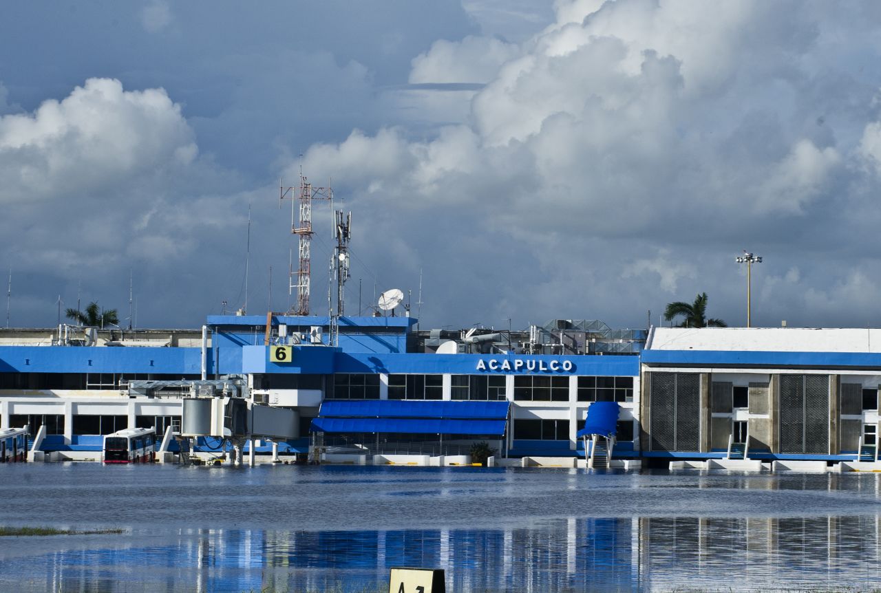 Water stands on the flooded tarmac of the Acapulco airport on September 17. 