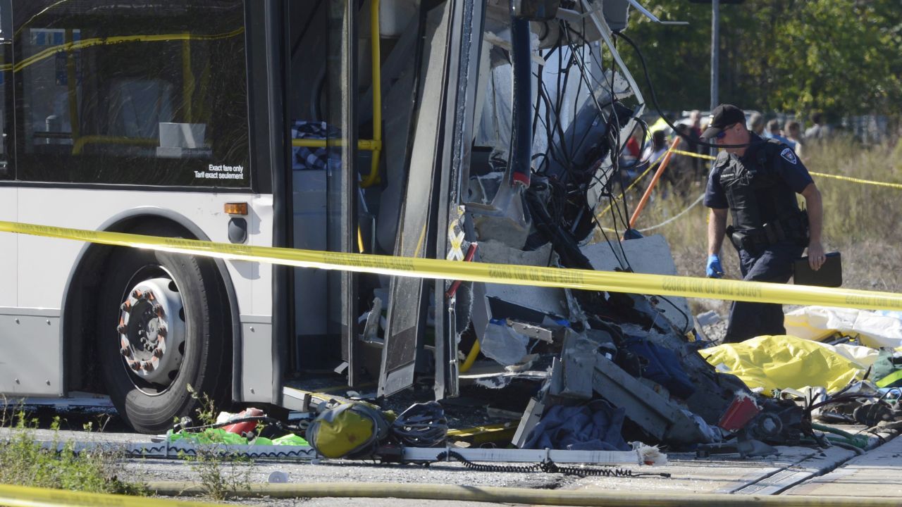 A rescue worker inspects the scene of the crash on September 18.