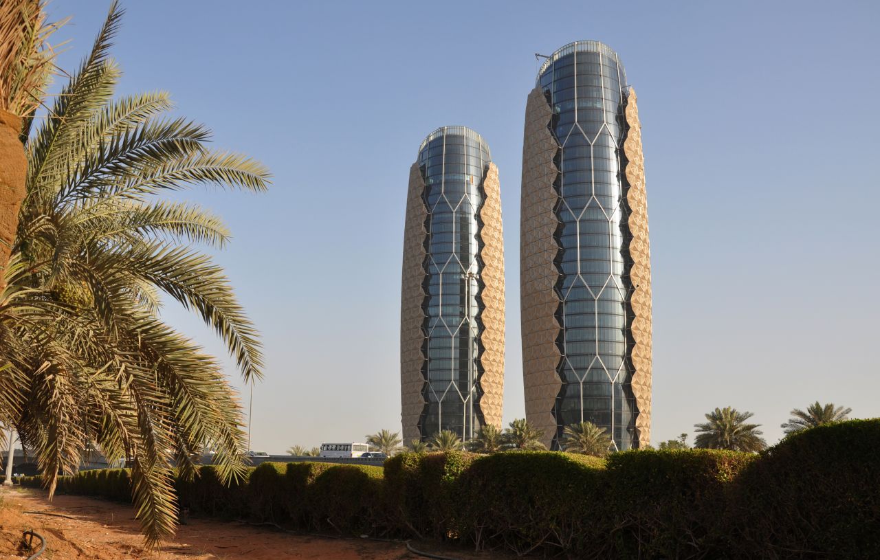 The Al Bahr Towers have a dynamic, translucent facade that runs off power generated by photovoltaic panels and that reacts to sunlight. The facade aims to reduce interior temperature from sunlight by around 50%. The mobile facade consists, per building, of 2,000 umbrella-like elements that can be opened and closed. <strong>Architects</strong>: Aedas Architects; Diar Consult