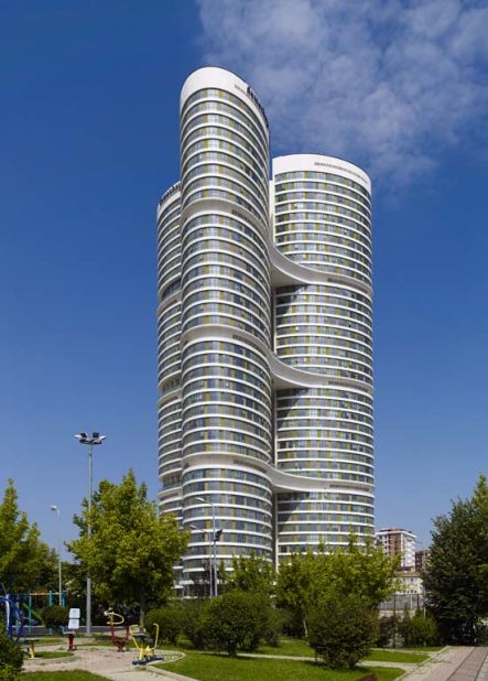 The skyscraper consists of three interconnected elliptical towers joined to one another on the 12th, 22nd and 32nd floors. Dumankaya IKON houses 1,022 apartments and 37 home-office units. The ground floor is designed to house a shopping center.<strong>Architect</strong>: TAGO Architects