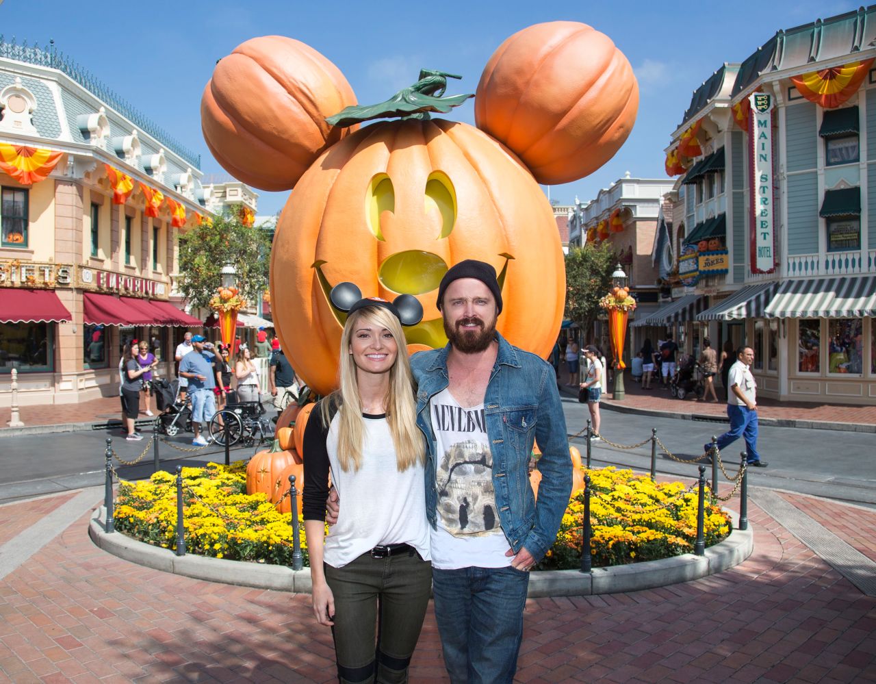 Aaron Paul and wife Lauren Parsekian enjoy "Halloween Time" at Disneyland on September 17.