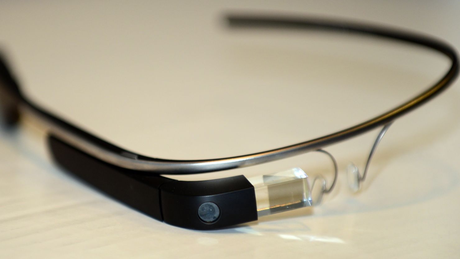 New Google Glass will work better with eyeglasses and include an ear bud for better audio, Google says.