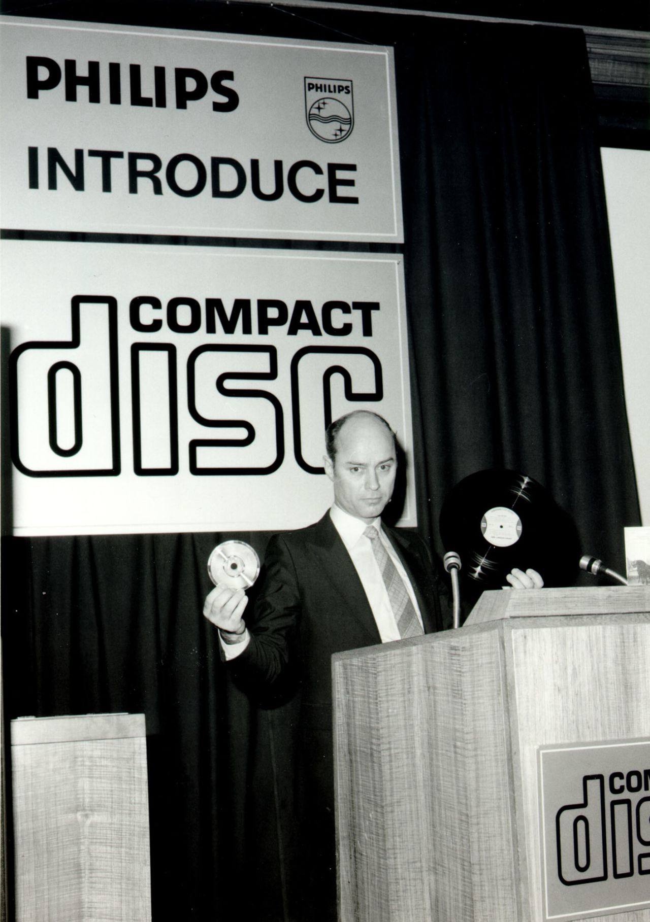 The compact disc (CD) promised high-quality digital sound in a portable optical format. Sales peaked in the late '90s and early 2000s, though it's still prominent today. The disc became a collaboration between Sony and Philips; here, Philips' Joop Sinjou shows his company's version on March 9, 1979.