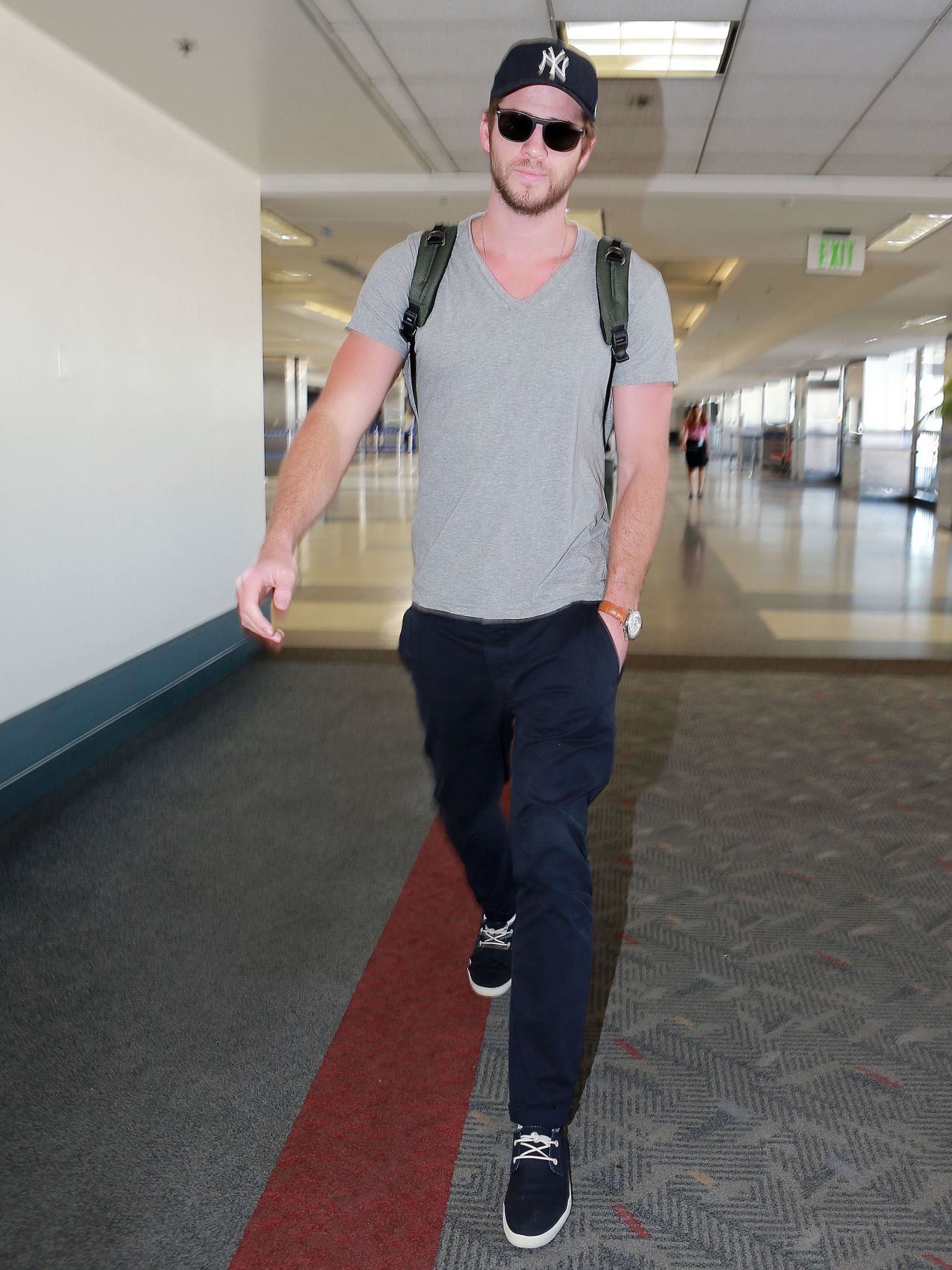 Liam Hemsworth keeps a low profile at LAX on September 18.