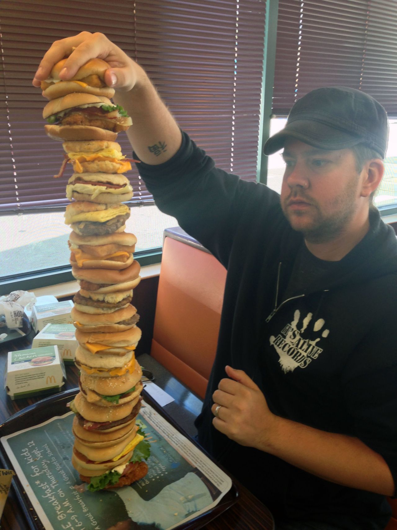It took 'lots and lots of bamboo skewers' to keep Chipman's gigantic sandwich together, but he persevered.