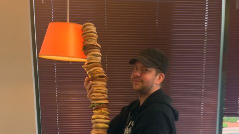 Nick Chipman poses with his McEverything burger.