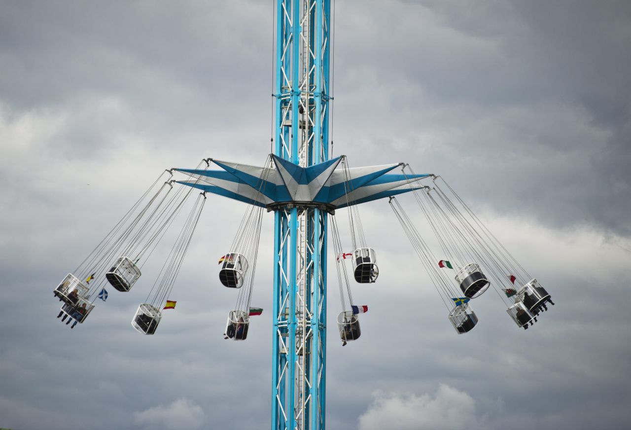 On September 18 the Star Flyer ride is seen near a dark cloud in the South Bank in London.
