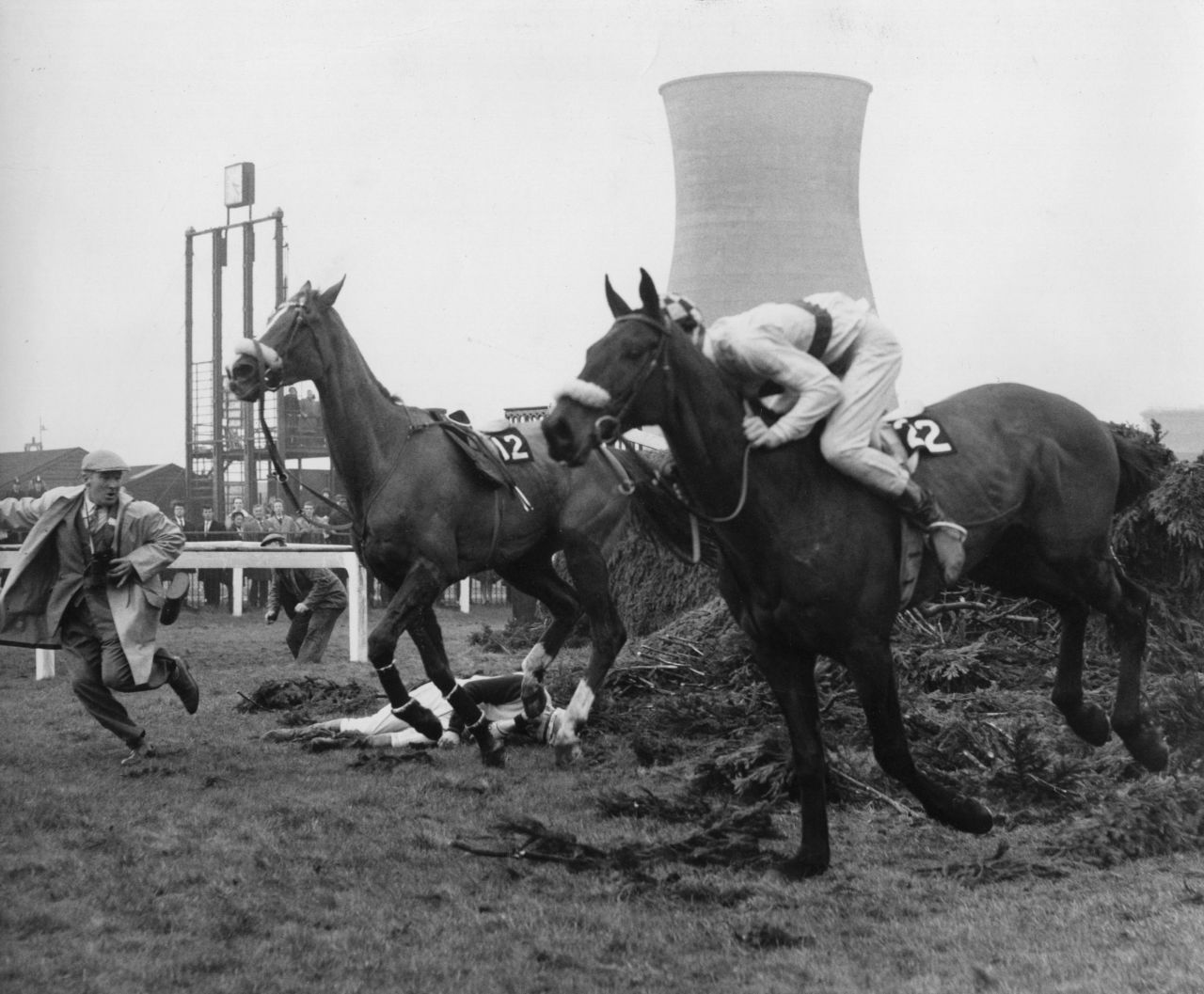 The IJF was founded in 1964 after jockey Paddy Farrell, lying prostrate in this picture, was paralyzed for life after falling at that year's Grand National. With insufficient assistance then available to jockeys in such plight, and with Tim Brookshaw having also suffered paralysis not long before, the Farrell-Brookshaw fund was created - ultimately turning into today's IJF.