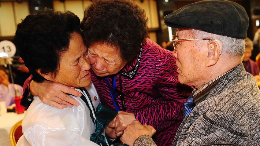 MOUNT KUMGANG, NORTH KOREA - NOVEMBER 03: (SOUTH KOREA OUT) South Korean Kim Sung-Bok (R), 90, meets his North Korean daughter Kim Hee-Sook (L), 61, during a family reunion after being separated for 60 years following the Korean War on November 3, 2010 in Mount Kumgang, North Korea. Red Cross officials from the two Koreas exchanged lists of families to be reunited - 100 names each - at a checkpoint in the border town of Kaesong in North Korea. (Photo by Kim Chang-Gil-Korea Pool/Getty Images)