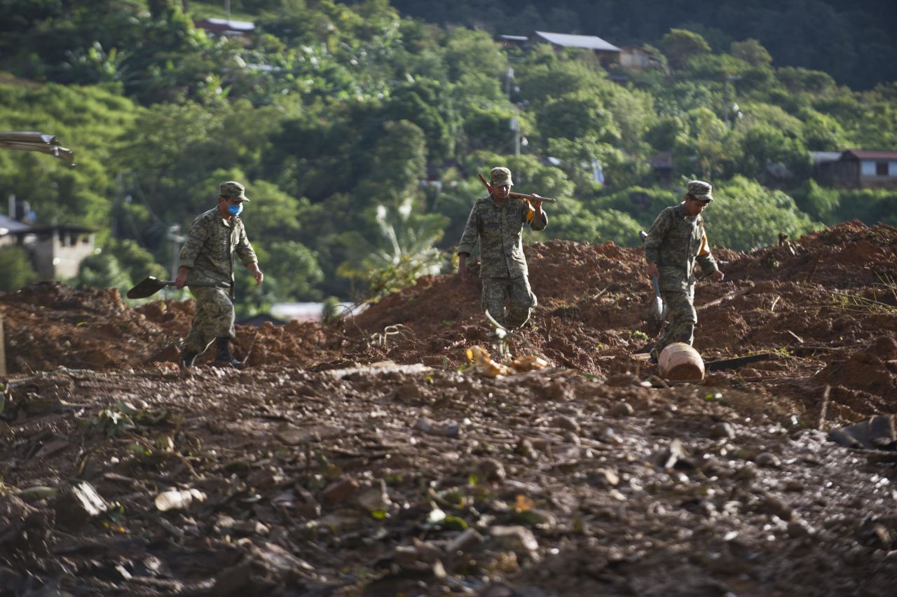Mexican soldiers search through mud and debris in the state of Guerrero on September 20. Guerrero was the hardest-hit state from the dual onslaught of Hurricane Manuel and sister storm Ingrid.
