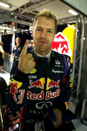 The Red Bull star, who had decided not to set a second lap time, celebrates in trademark fashion after his rivals fail to overhaul him.