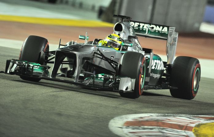 Mercedes driver Nico Rosberg qualified second ahead of Lotus' Romain Grosjean and Vettel's teammate Mark Webber.