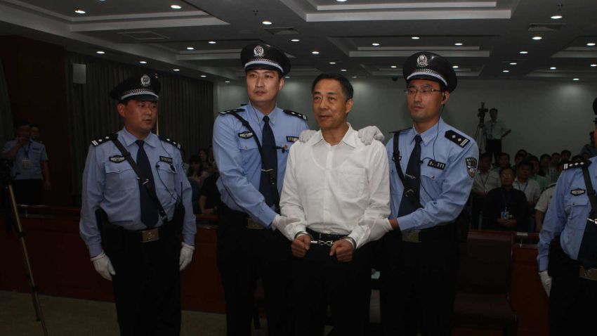 Photo released by Jinan Intermediate People's Court of Bo Xilai in handcuffs following his guilty verdict Sunday.