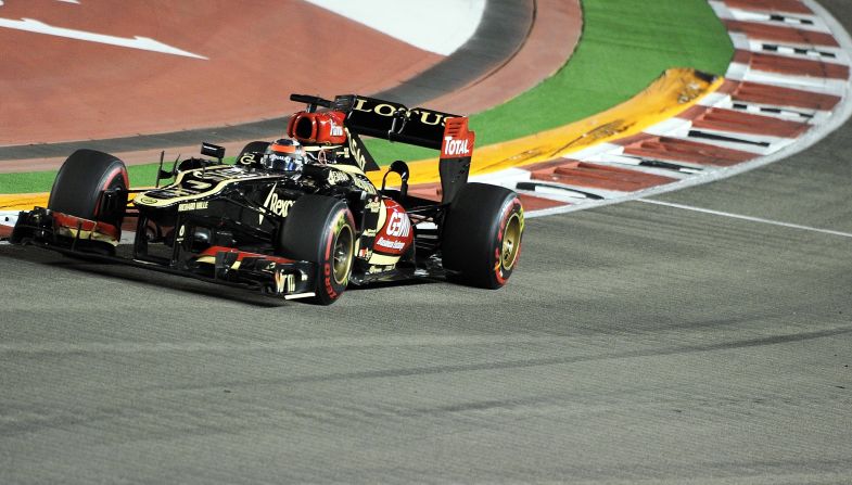 Like Alonso, Kimi Raikkonen battled his way up from down the grid to take third place for Lotus, despite being troubled by back problems in Saturday's qualifying.