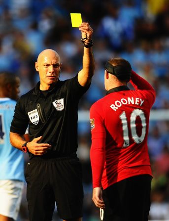 With Robin van Persie ruled out by injury before the match, Wayne Rooney was given even more reponsibility for United's attacking fortunes. He was frustrated for much of the match, earning a booking for a tussle with City captain Vincent Kompany, but struck a fine consolation free-kick in the closing minutes. 