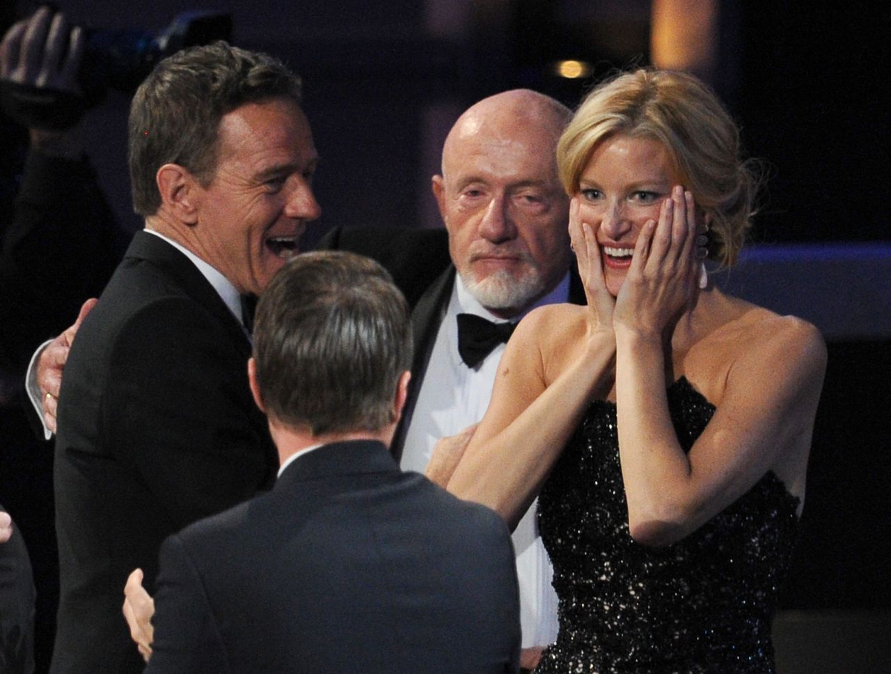 From left, actors Bryan Cranston, Aaron Paul, Jonathan Banks and Anna Gunn react to "Breaking Bad" winning outstanding drama.