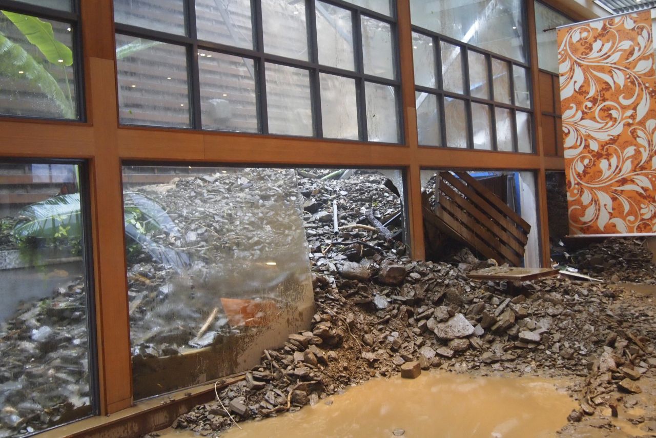 Typhoon Usagi's torrential rains caused landslides at a southern Taiwanese resort, sending mud and rocks crashing through the windows late Saturday, September 21.