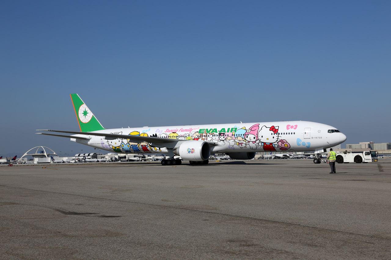 That is one eye-catching plane livery. The new Hello Kitty Boeing 777 themed "Sanrio Family hand-in-hand" has Hello Kitty and 18 other Sanrio characters all holding hands.