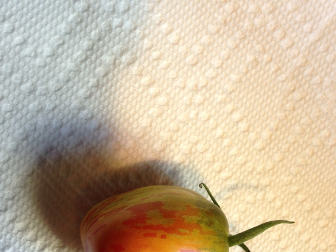 This heirloom Green Zebra tomato is almost too lovely to eat. Almost.