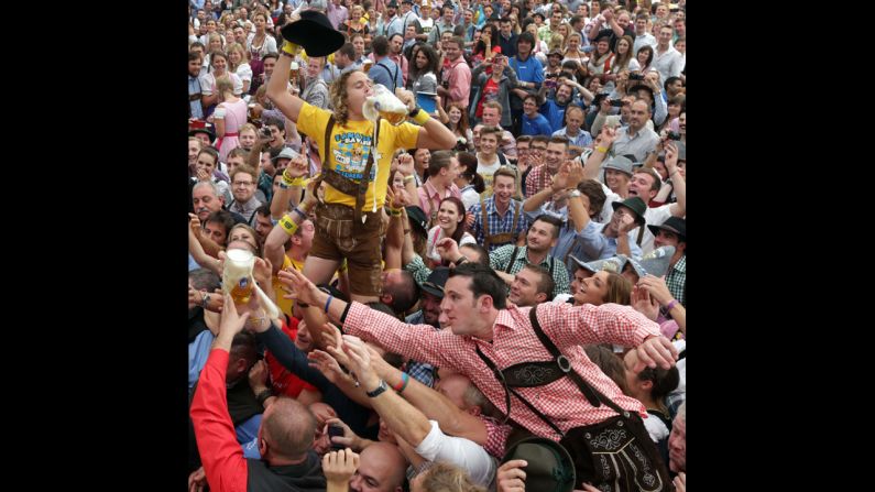 People celebrate the opening ceremony of Oktoberfest.