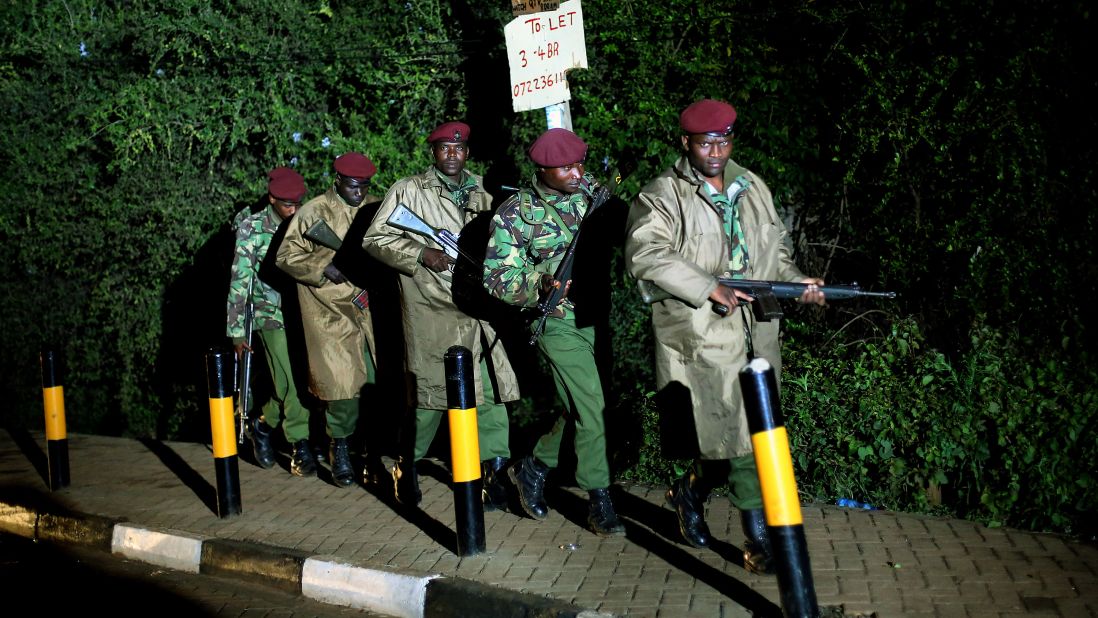 Kenyan Defense Forces walk near the mall on Monday, September 23.