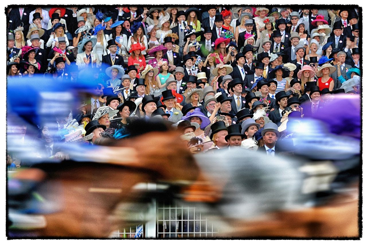<strong>Royal Ascot, Ascot, Berkshire, UK:</strong> Runners pass the grandstand in the Ascot Stakes during day one of Royal Ascot. "You can't really go too far wrong. It's always nice colors, smart clothing," added Crowhurst.  