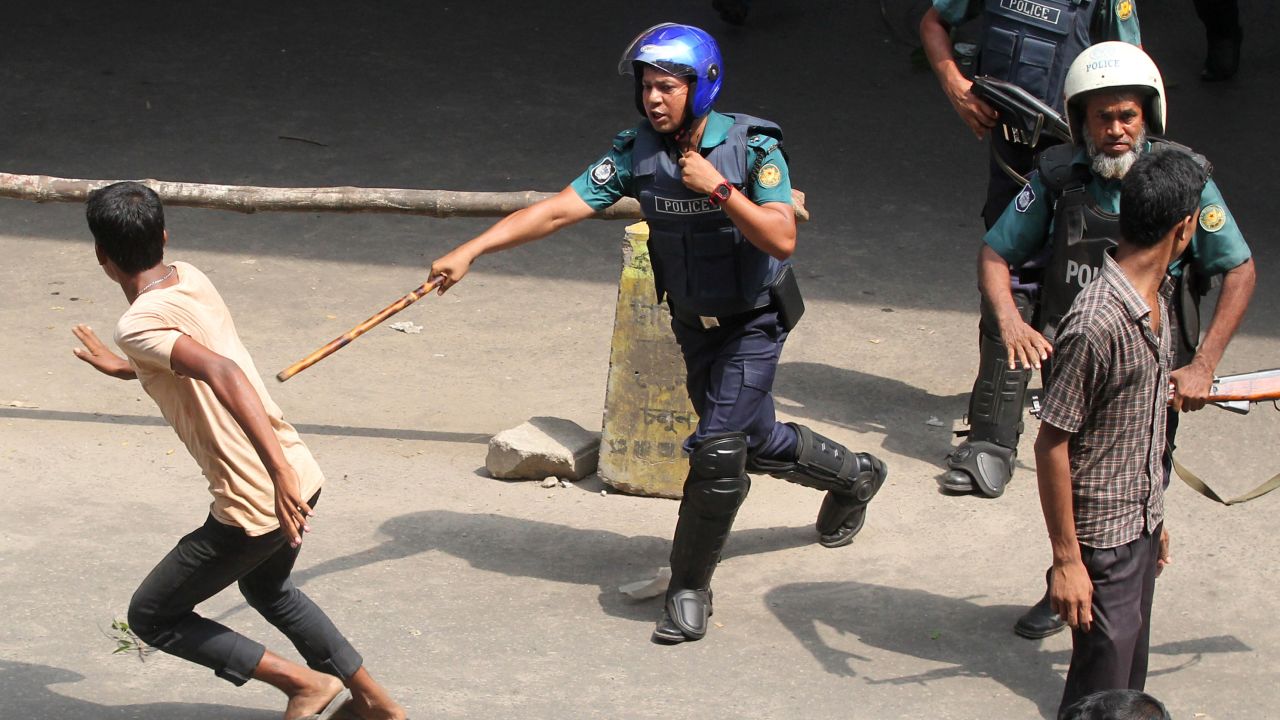 Police clash with protesting garment workers in Dhaka.