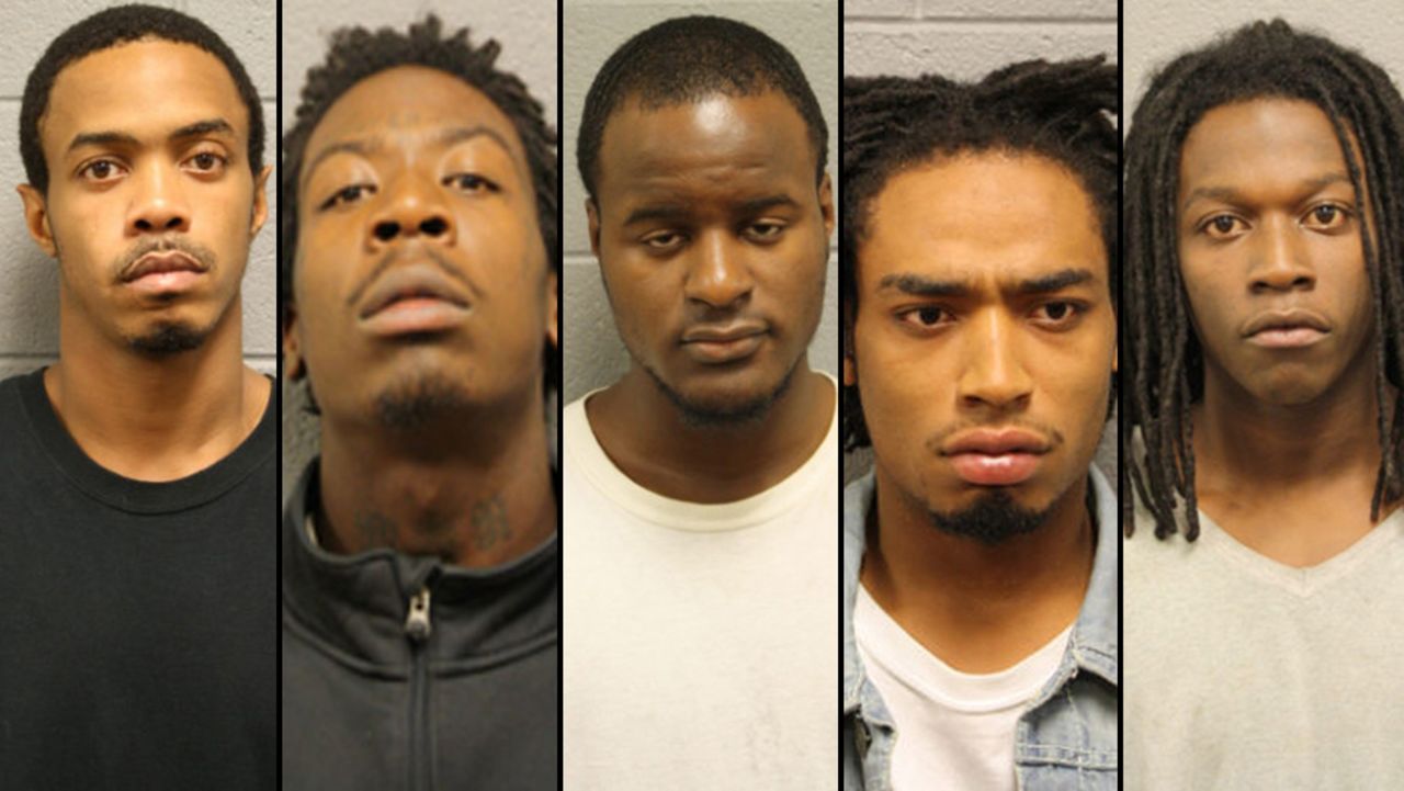 Chicago police have arrested five people in connection with a September 19, 2013, shooting on Chicago's Back of the Yards neighborhood. The shooting injured 13 people, including a 3-year-old boy.