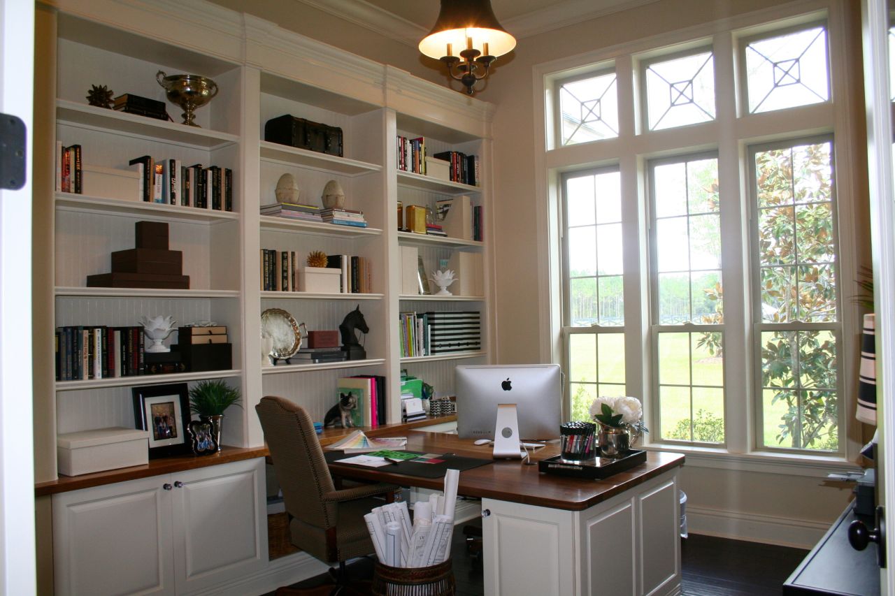 <a href="http://ireport.cnn.com/docs/DOC-1037220">Lori Evans</a> said she often stood back to check the balance of <a href="http://evanshomebuilding.com/" target="_blank" target="_blank">decor</a> in the built-in bookcase in her home office as she filled it with accessories and books. Her prized treasure on the shelves is a signed Tim Tebow button. Want to know more? Ask Evans in the comments section.