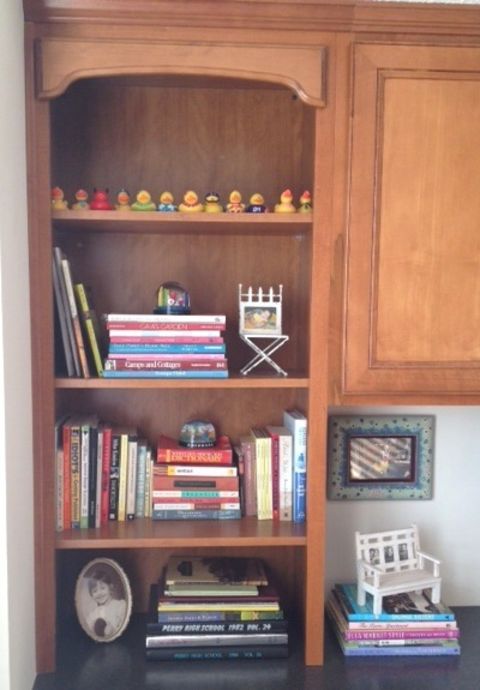 <a href="http://ireport.cnn.com/docs/DOC-1036206">Andrea Trbovich's</a> bookshelf wasn't necessarily her style, but she said the <a href="http://www.homagestyle.com/" target="_blank" target="_blank">colors, shapes and textures </a>of her book collection always draws her in. Are you in the same boat? Discuss your bookshelf decorating dilemmas in the comments section below.