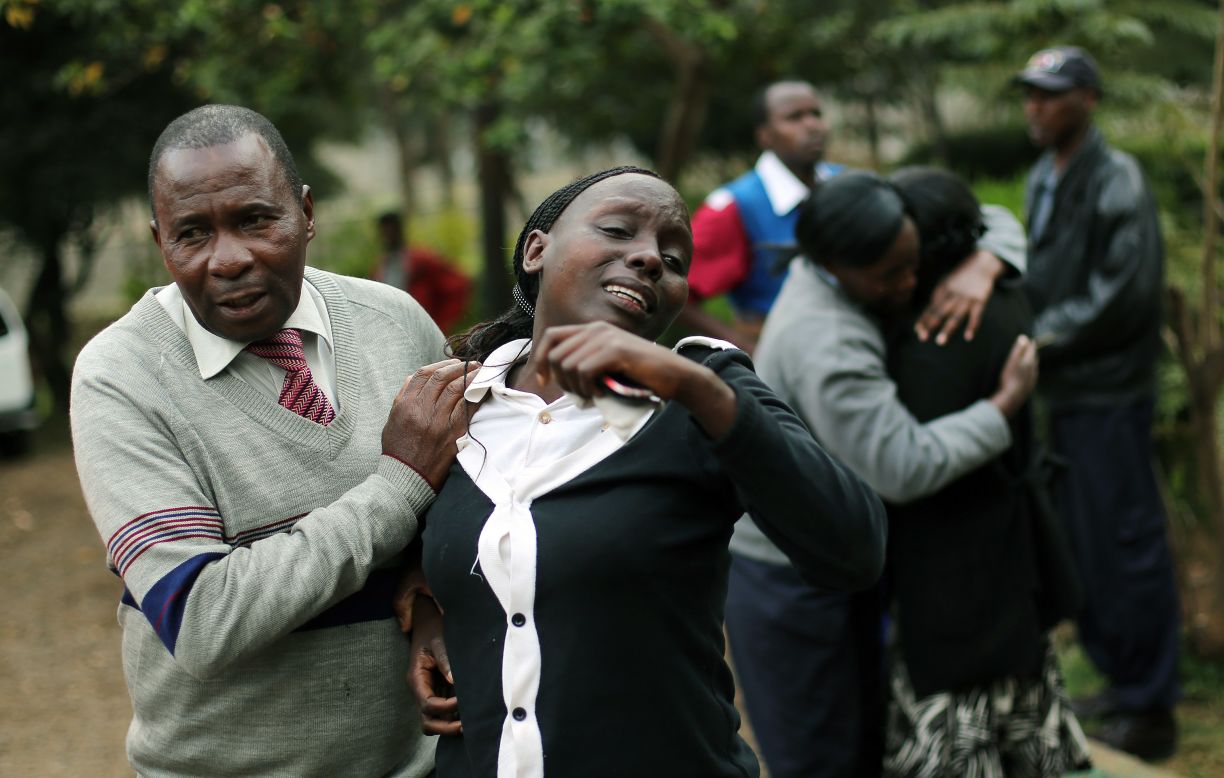 Relatives of Johnny Mutinda Musango, 48, weep after identifying his body at the city morgue  in Nairobi, Kenya, on Tuesday, September 24. Musango was one of the victims of the Westgate Mall hostage siege. Kenyan security forces were still combing the mall on the fourth day of the siege by al Qaeda-linked terrorists.