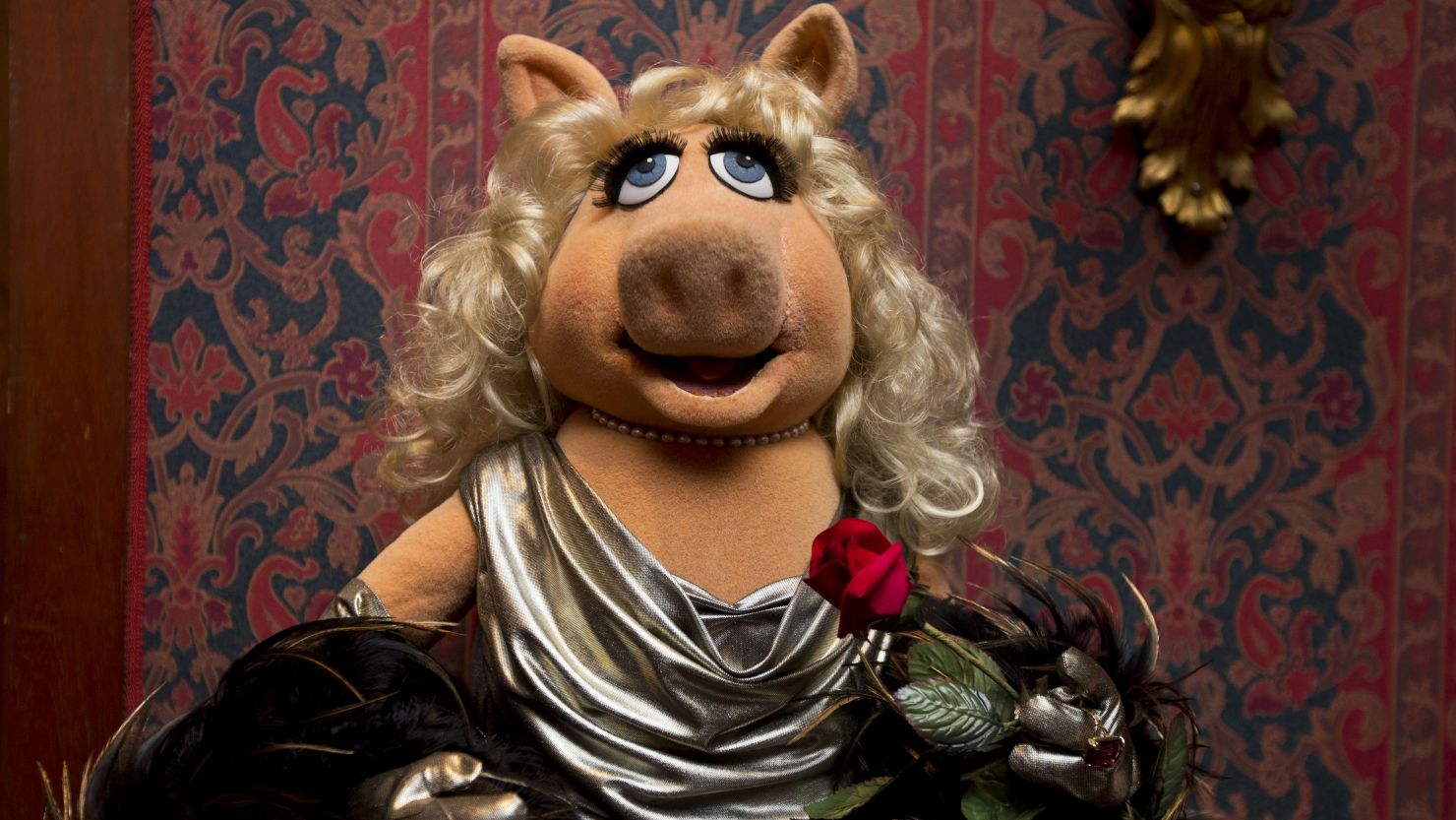 A Miss Piggy muppet used in "The Muppet Show," is all dressed up during a ceremony to donate additional Jim Henson objects to the Smithsonian's National Museum of American History in Washington.  