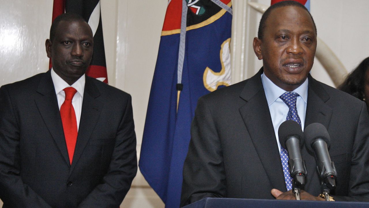 Kenyan President Uhuru Kenyatta, right, is scheduled to appear in front of the International Criminal Court next month. Deputy President William Ruto, left, is on trial now.