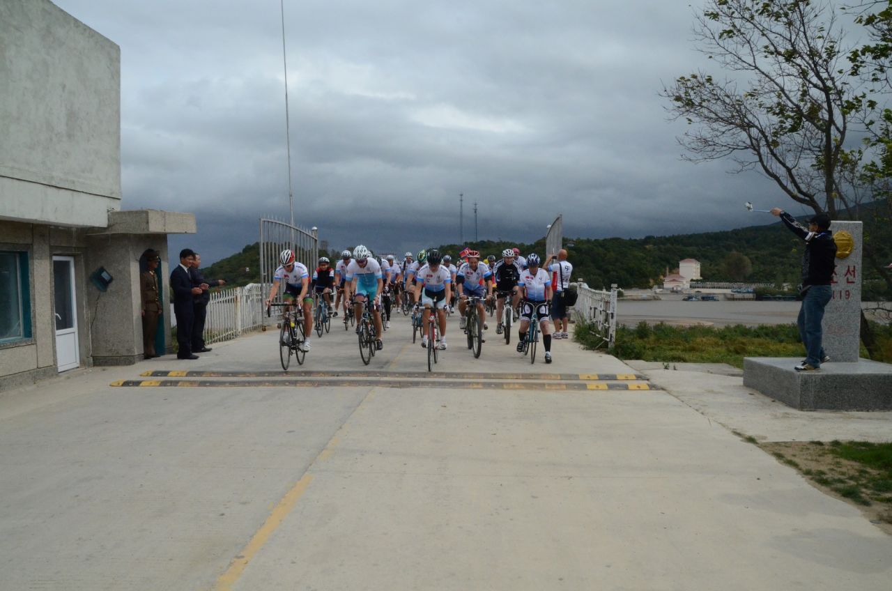 Bikers coming off the bridge over the Tumen River between China and North Korea, the starting point of the race.
