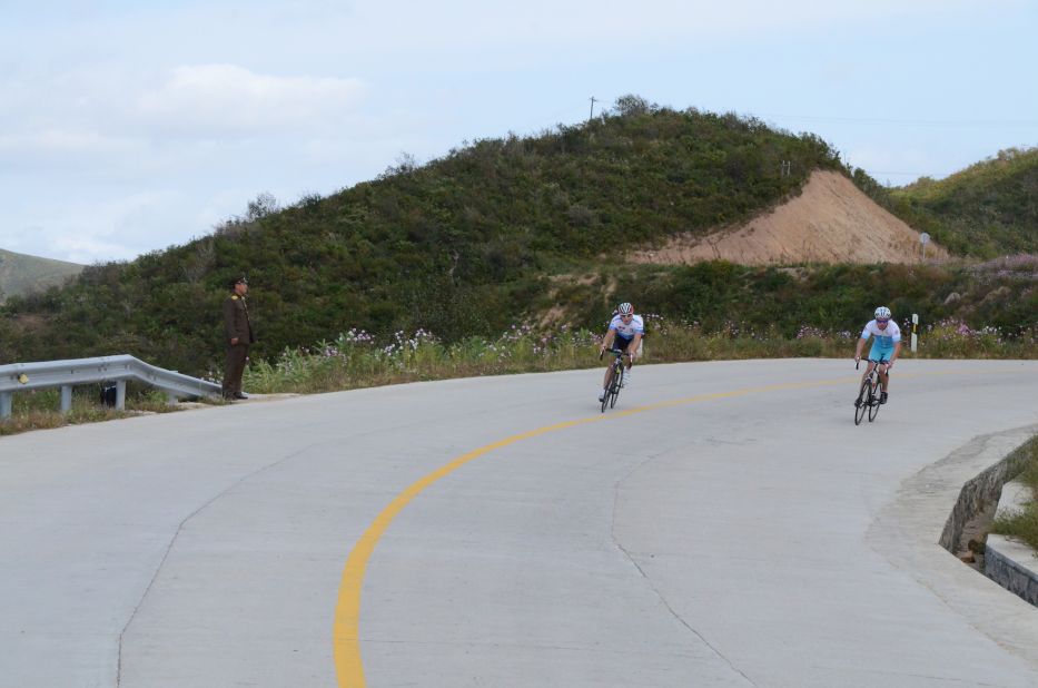 North Korean soldiers line the roads of the race.