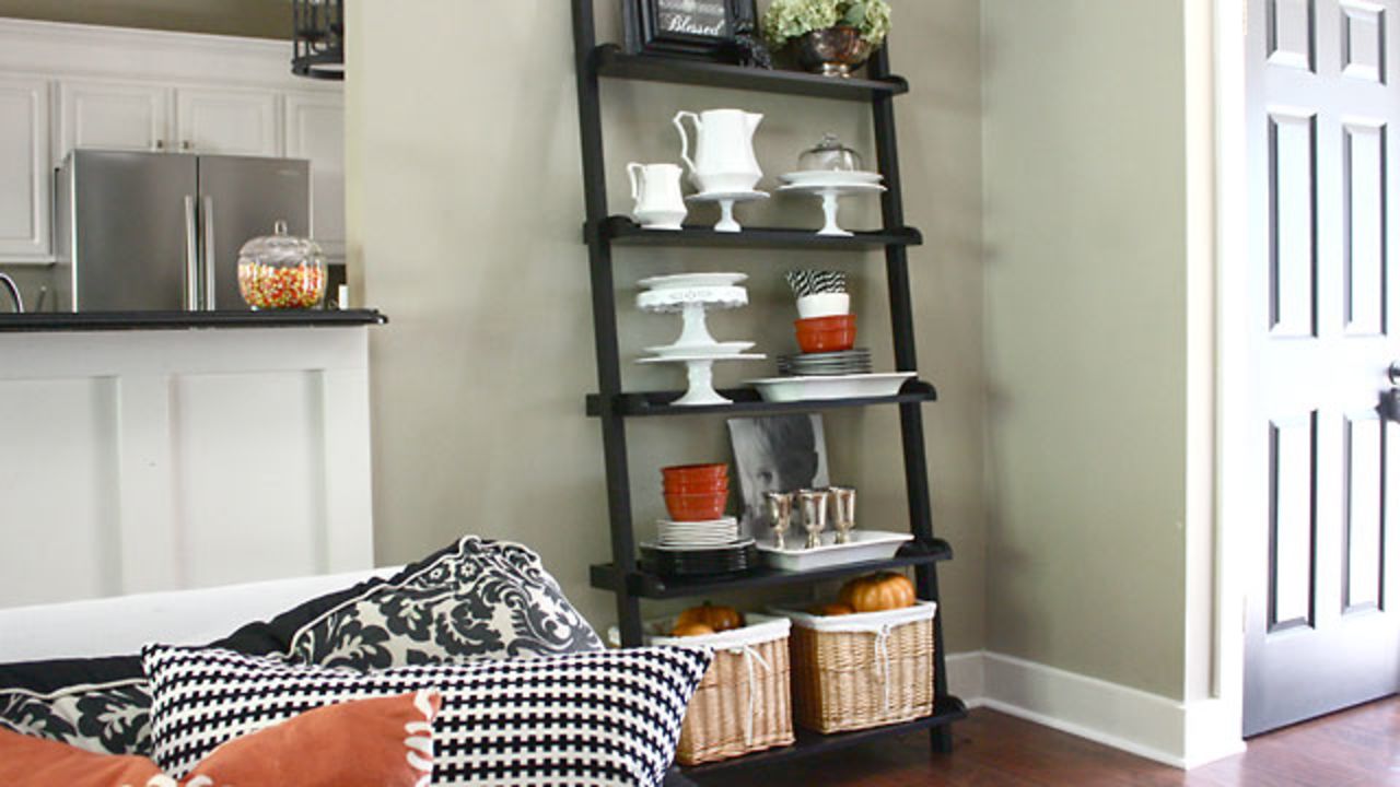 <a href="http://ireport.cnn.com/docs/DOC-1039299">Sarah Macklem </a>loves to entertain, so she <a href="http://www.theyellowcapecod.com/" target="_blank" target="_blank">decorated the bookshelf in her living room</a> with seasonal dishes and barware, including a new set of tarnished, vintage silver wine glasses that are "just waiting to be filled with Witch's Brew wine," she said. Want to know more about this style of bookshelf? Ask Macklem in the comments section below.
