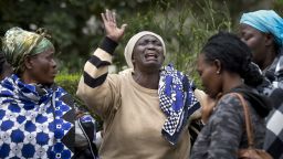 Mary Italo, center, grieves with other relatives for her son Thomas Abayo Italo, 33, who was killed in the Westgate Mall attack, as they wait to receive his body at the mortuary in Nairobi, Kenya Wednesday, Sept. 25, 2013