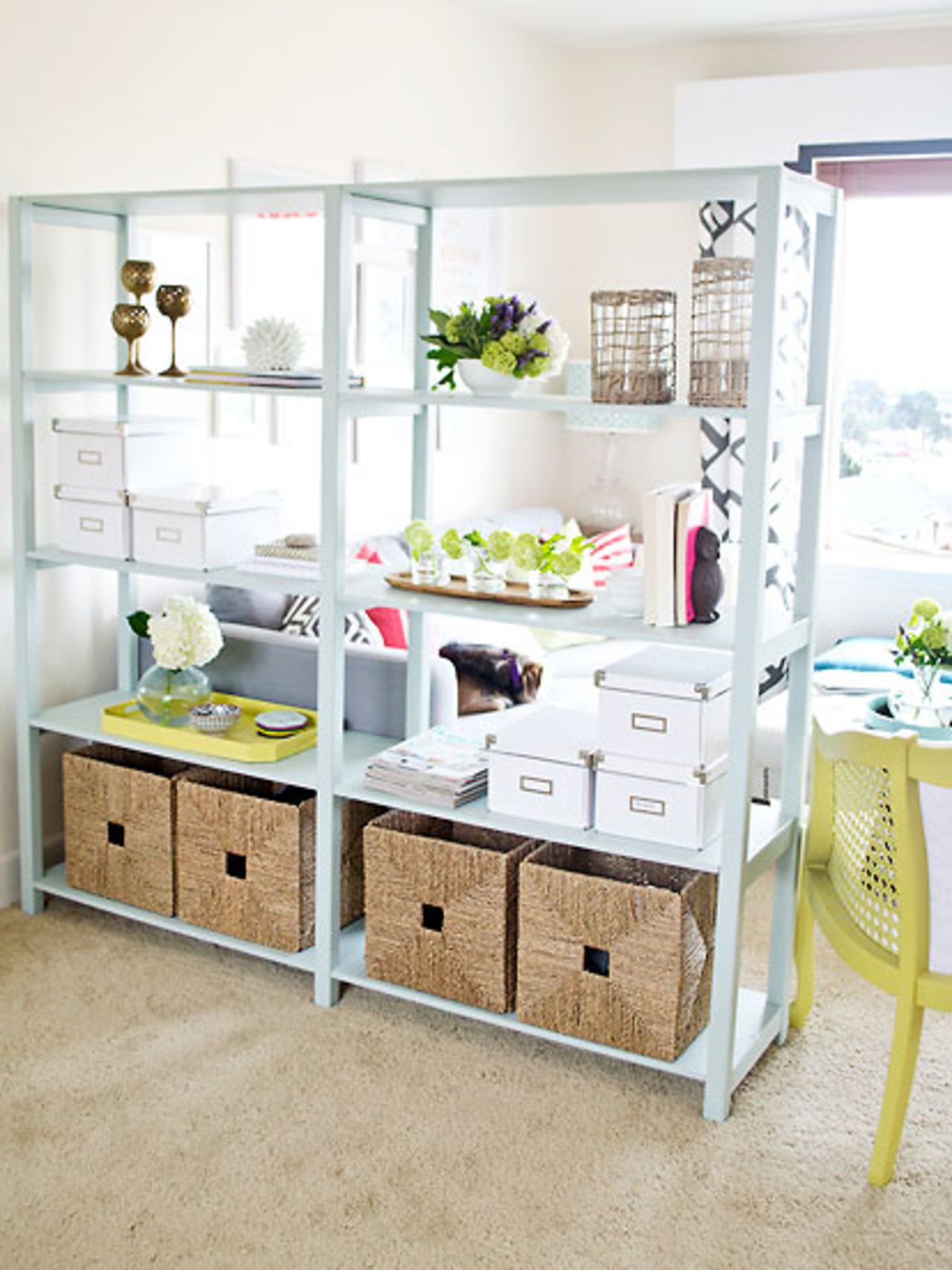 <a href="http://ireport.cnn.com/docs/DOC-1035356">Sarah Dorsey</a> said she enjoys the <a href="http://sarahmdorseydesigns.blogspot.com/" target="_blank" target="_blank">color and texture</a> that flowers brought to her bookshelves, but her antique brass candlesticks are a close second. Want to know more? Ask her in the comments section below.
