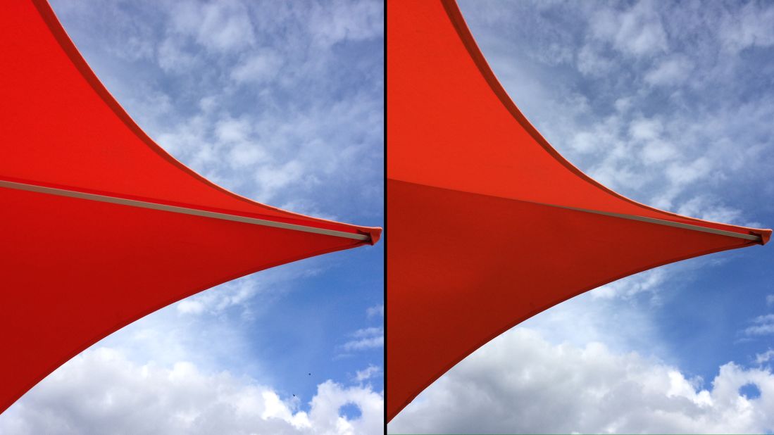 The red color of this awning and the blue of the sky look richer and more saturated in the iPhone 5S picture on the right.