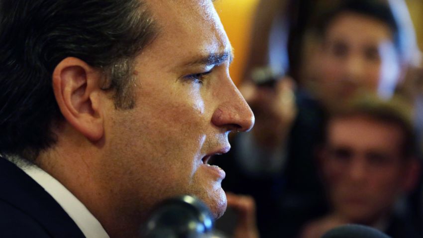 WASHINGTON, DC - SEPTEMBER 25: U.S Sen. Ted Cruz (R-TX) speaks to members of the media as he comes out from the Senate Chamber after he spoke on the floor for more than 21 hours September 25, 2013 on Capitol Hill in Washington, DC. Sen. Cruz ended his marathon speech against the Obamacare at noon on Wednesday. (Photo by Alex Wong/Getty Images)