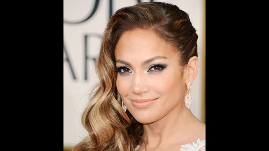 Jennifer Lopez delivers drama with radiant skin highlighted by makeup artist Mary Phillips.