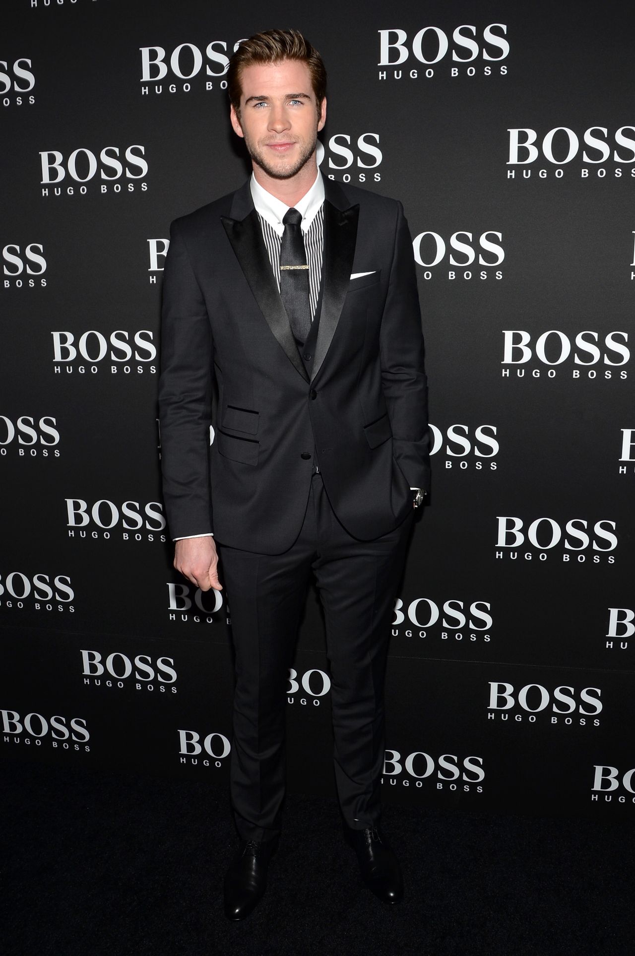 Liam Hemsworth looks calm and collected at a HUGO BOSS store opening in New York City on September 24. 
