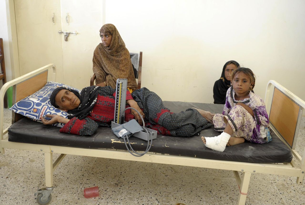 Survivors take shelter at a makeshift hospital in Awaran on September 25.