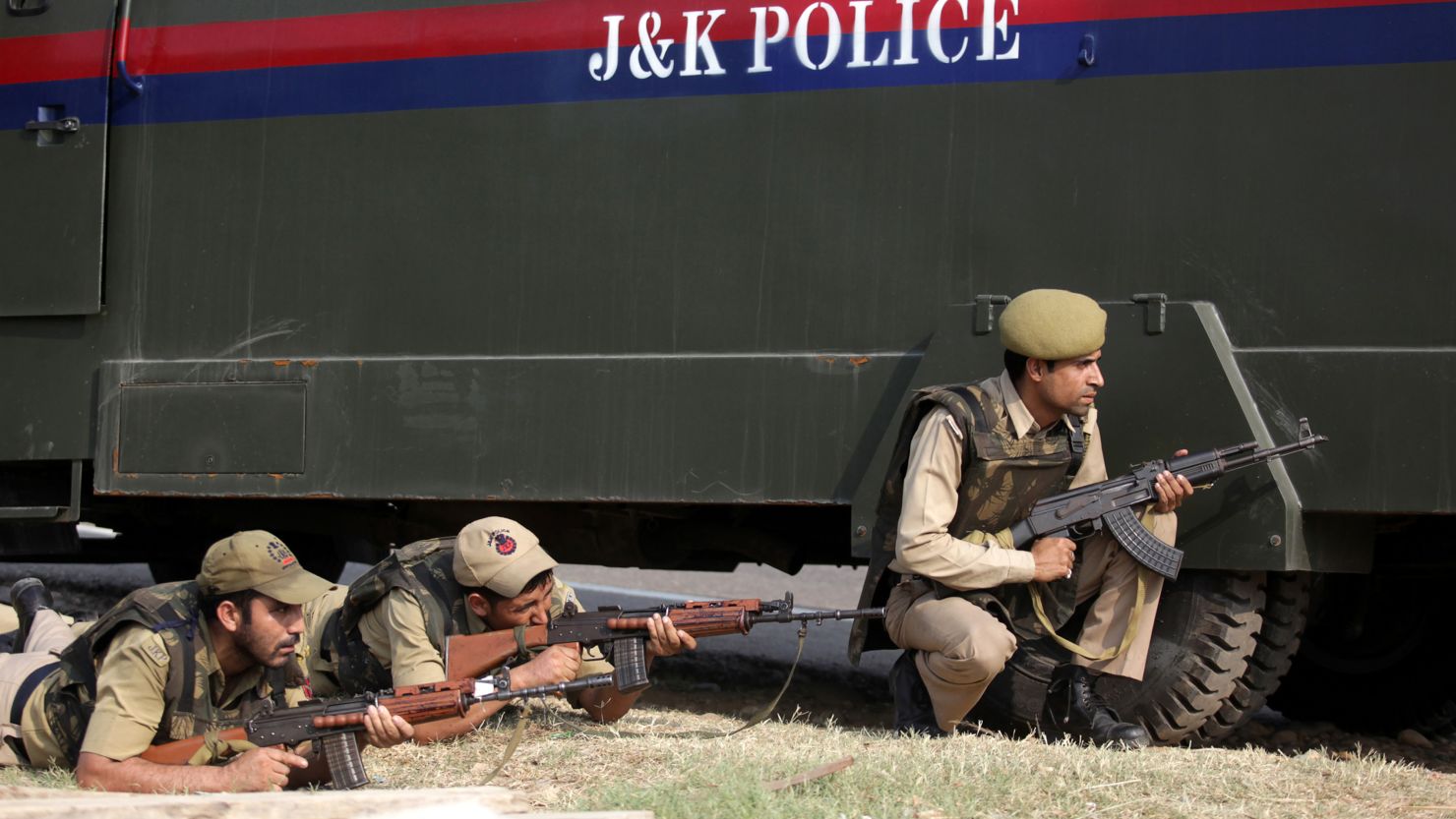 Indian police during an attack by militants on an army camp at Mesar in Samba District on September 26, 2013. 