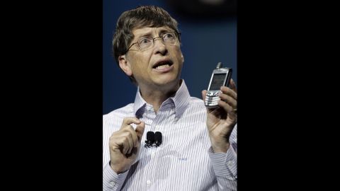 Gates holds a new Palm Treo 700w smartphone during a keynote address at the 2006 Consumer Electronics Show in Las Vegas.