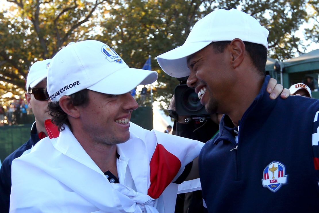 Tiger Woods (right) congratulates Europe's Rory McIlroy after the 39th Ryder Cup at Medinah.