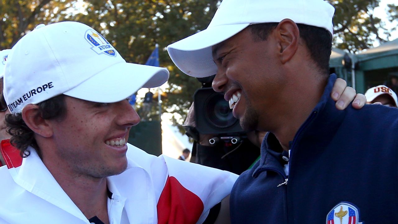 Tiger Woods (right) congratulates Europe's Rory McIlroy after the 39th Ryder Cup at Medinah.