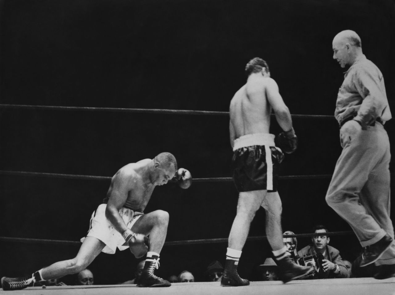 Sometimes it takes just one person to etch a place in the pantheon of great sporting comebacks. In 1952 American boxer Rocky Marciano (center) had been knocked down in the first round and was losing on all the judges' scorecards before he landed his own knockout blow in the 13th round to defeat Jersey Joe Walcott (left) and become the heavyweight boxing champion of the world.