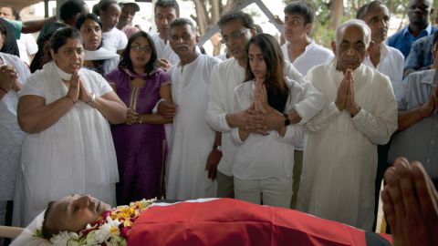 Family members pay their last respects at the funeral of Mitul Amritlal Shah at the Hindu Crematorium in Nairobi on September 26.